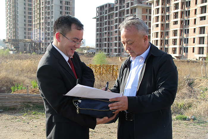 商丹园区2011-10号土地使用权及地上6栋建筑物移交市城投公司